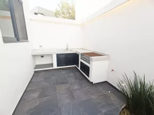 área de asador con barra y tarja