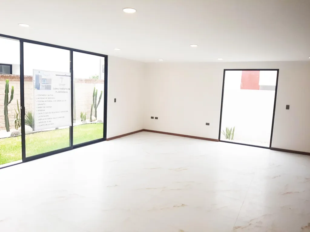 sala comedor con vista al jardín