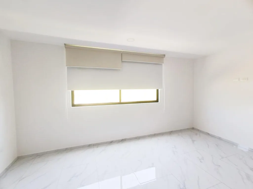 recamara principal con vestidor y baño
