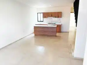 cocina integral con barra de granito abierta